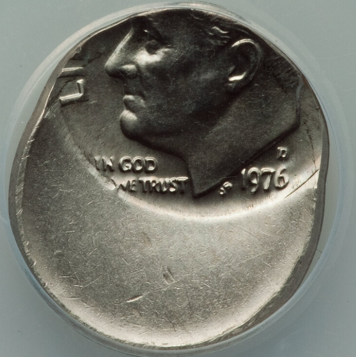 1976 dime off-center strike error showing blank crescent and shifted Roosevelt portrait